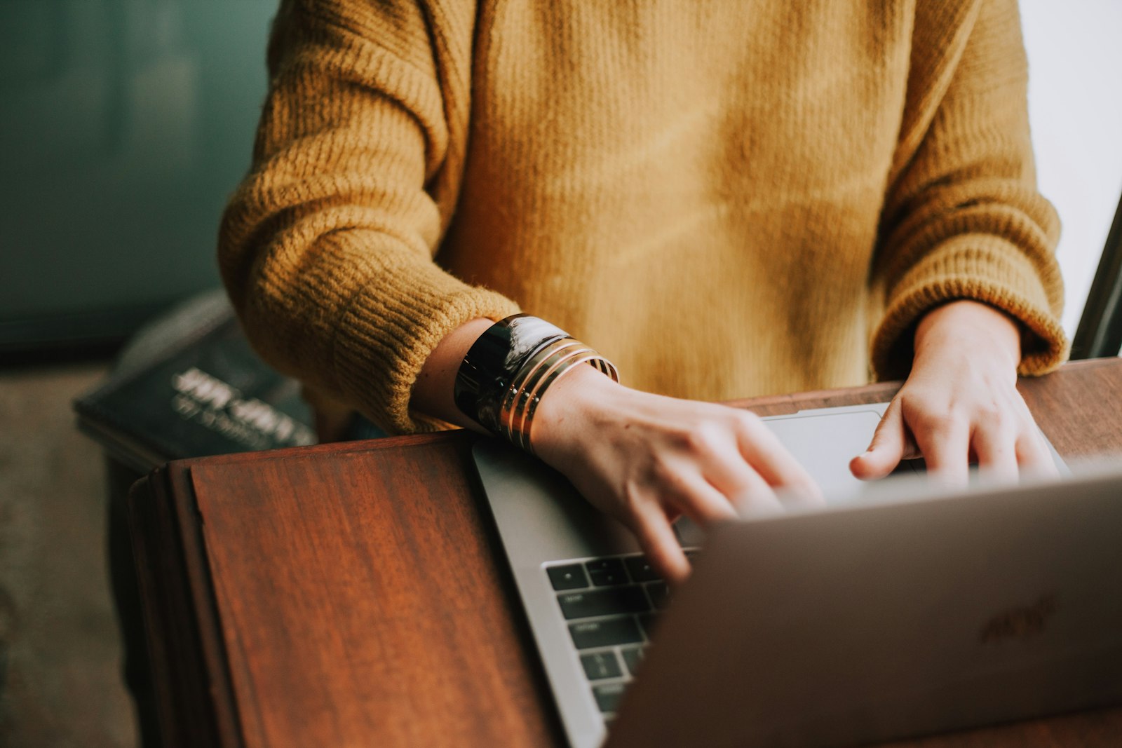 A consultant working at a laptop